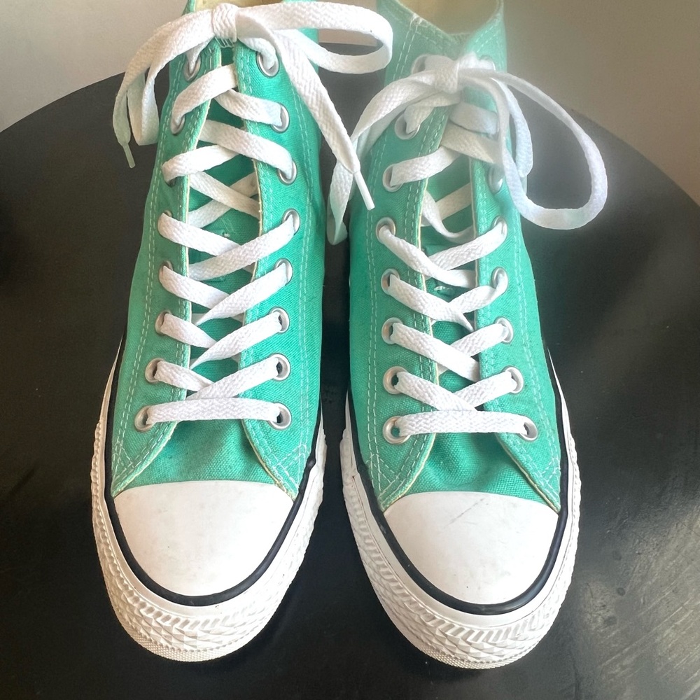Make A Statement in Converse Chuck Taylor Aqua Canvas lightweight High Tops.